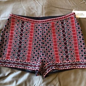 Quilted/ woven red and black shorts. Never worn. M